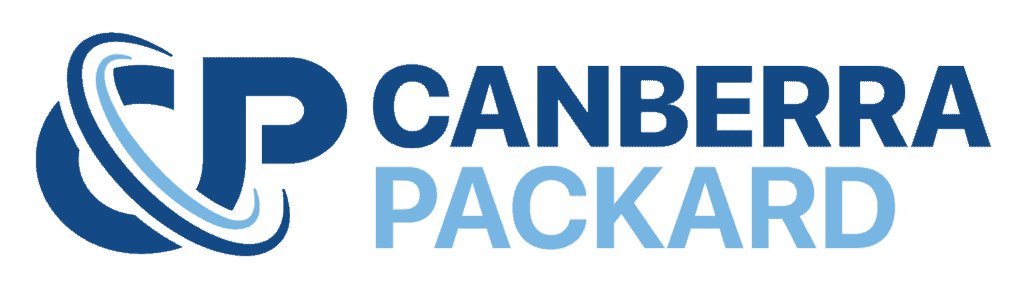 Vintage Canberra Packard car parked outdoors, showcasing classic automotive design.